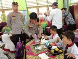 Wujud Kepedulian, Polres Banyuasin Bagikan Makanan Sehat Bergizi di SDN 13 Banyuasin III