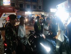 Perkuat Keamanan, Babinsa Tanjung Raja Patroli Siskamling Menyapa Warga Kelurahan Tanjung Raja